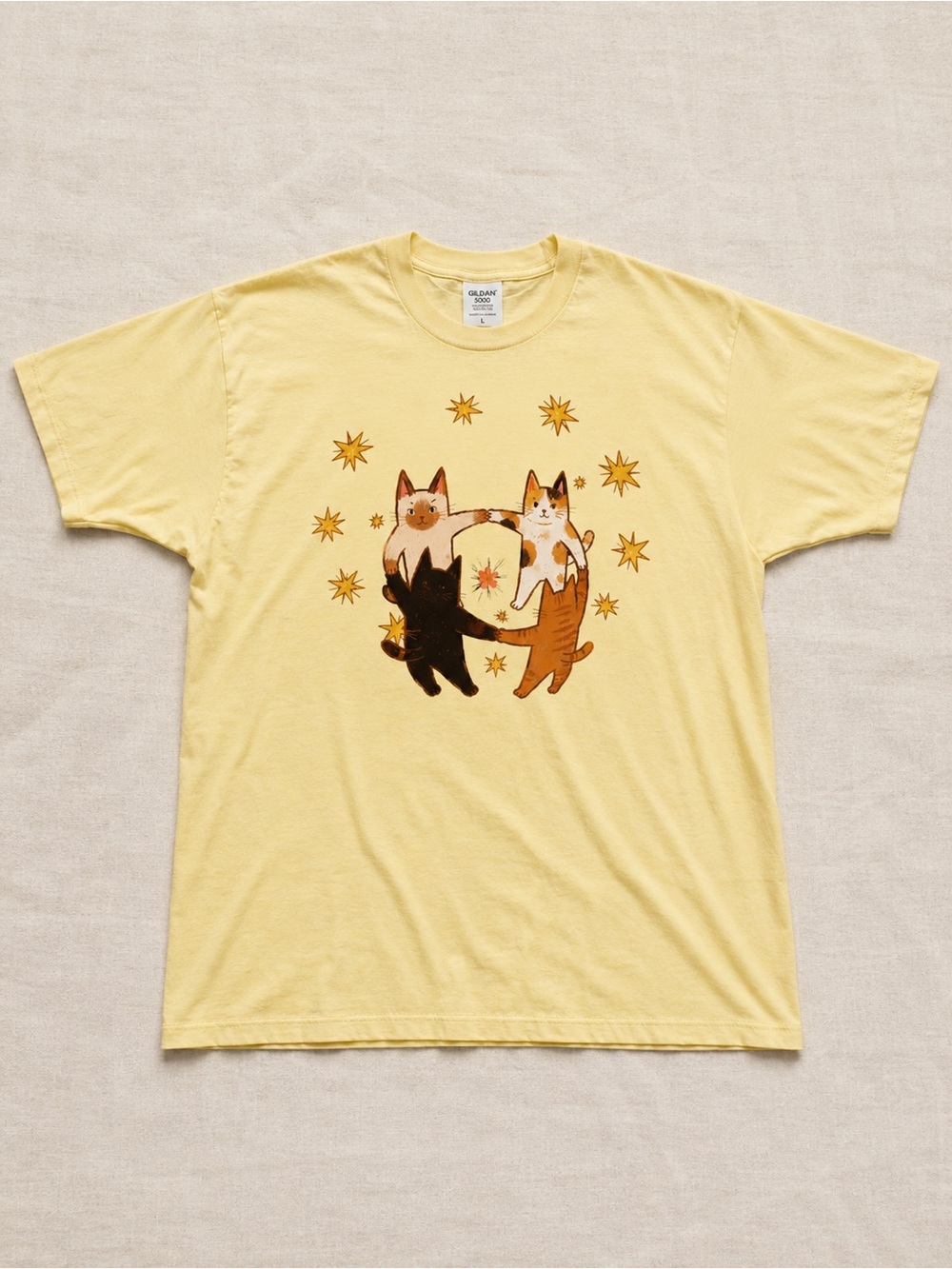 Pale Yellow Dog Graphic Tee with Playful Star Dogs T-shirt